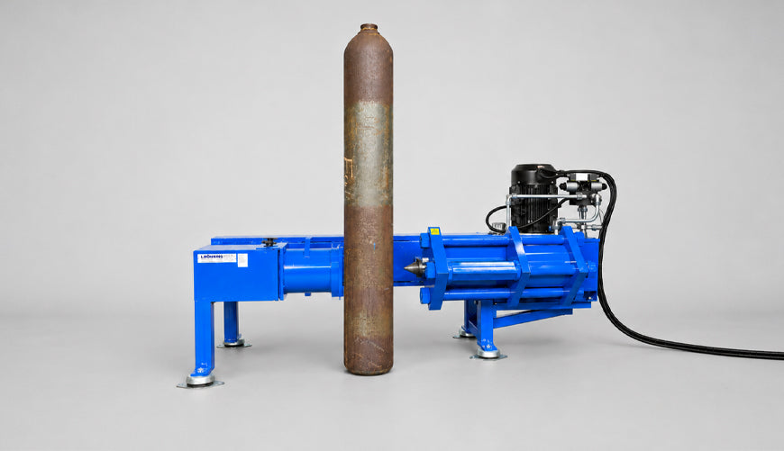Machine for pressing holes in seamless gas cylinders