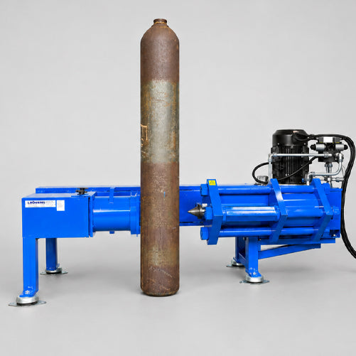 Machine for pressing holes in seamless gas cylinders